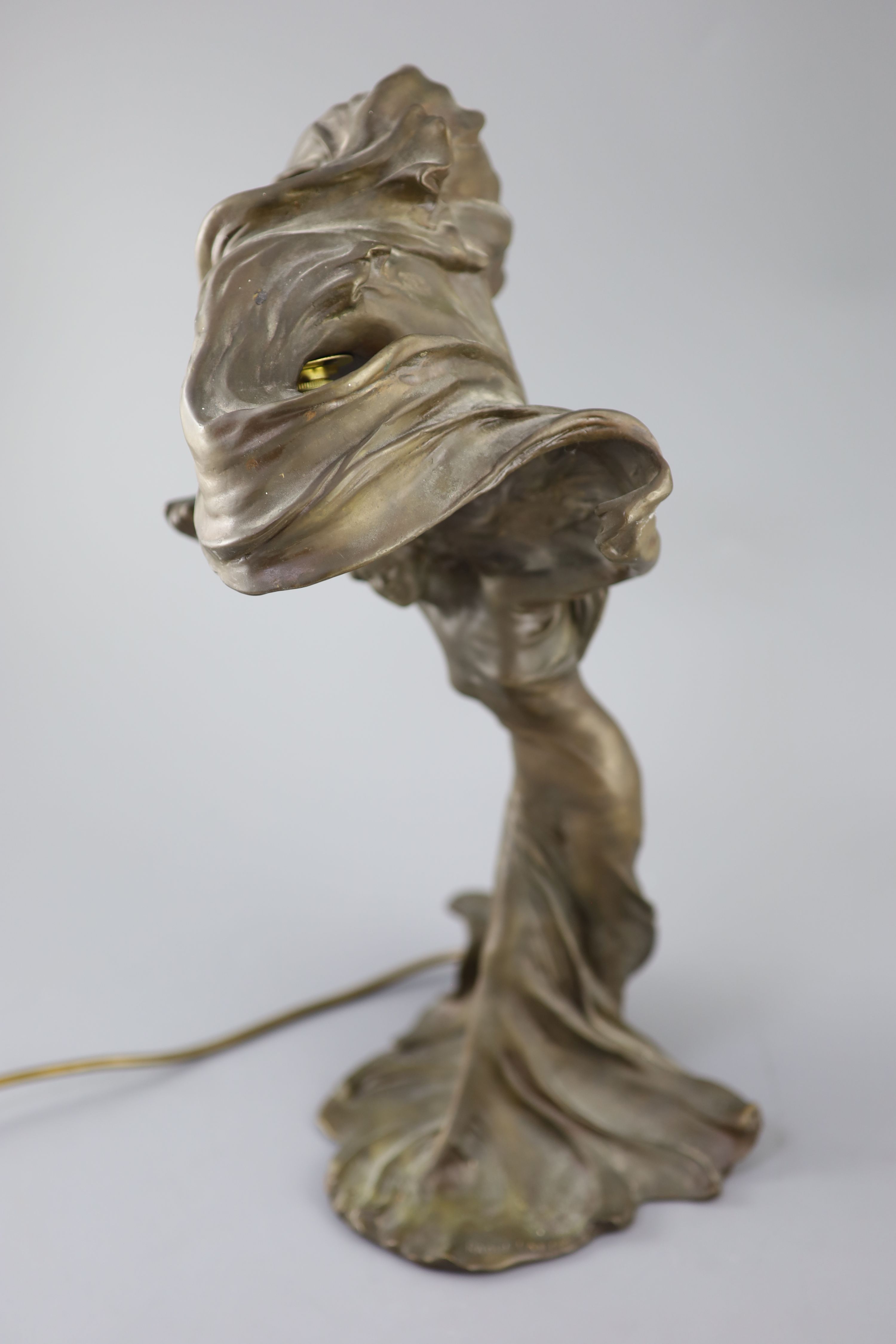 After Raoul Larche (1860-1912). A bronze Loie Fuller table lamp height 17in.